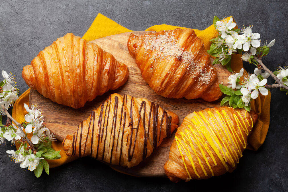 delicious-croissants-with-spring-blossoms-on-woode-2026-01-06-09-17-15-utc_optimized_200