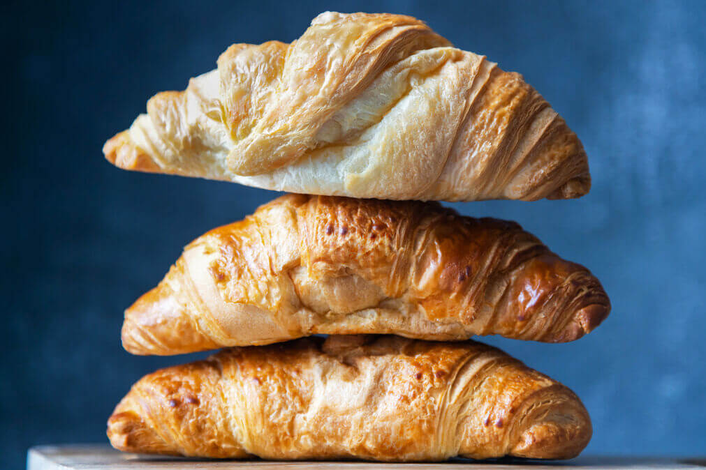 fresh-fragrant-croissants-lie-on-a-cutting-board-2026-03-17-17-39-52-utc_optimized_200